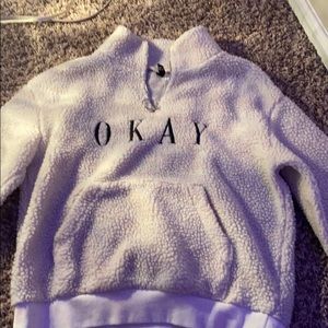 cream colored zip up hoodie